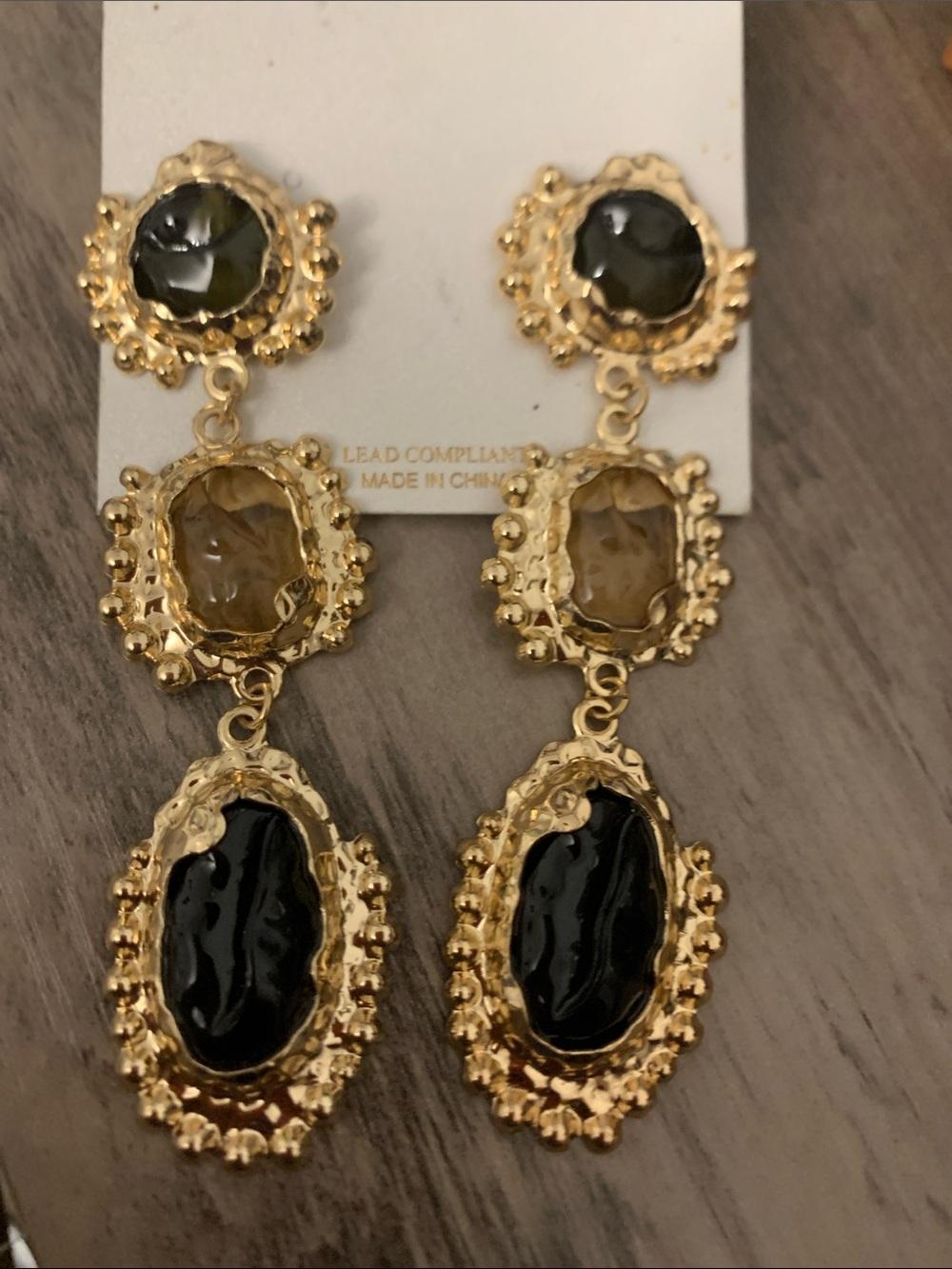 Natasha Couture Gold Drop Earrings with Black and Olive Stones